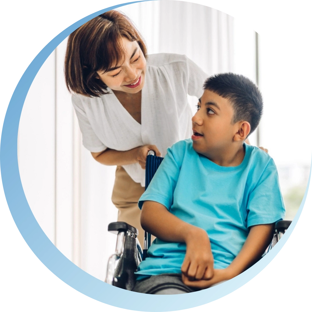 young disabled boy on wheelchair with a nurse